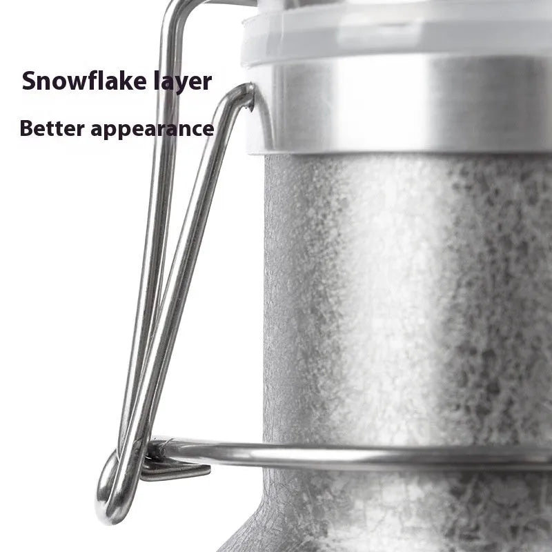 Stainless steel thermal pot with large capacity for outdoor and portable use.