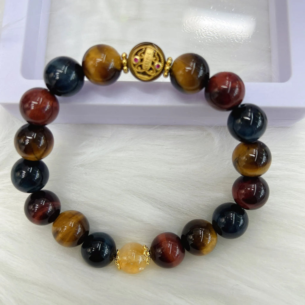 Natural tiger eye stone round beads on a Maillard chain bracelet, 18cm long.