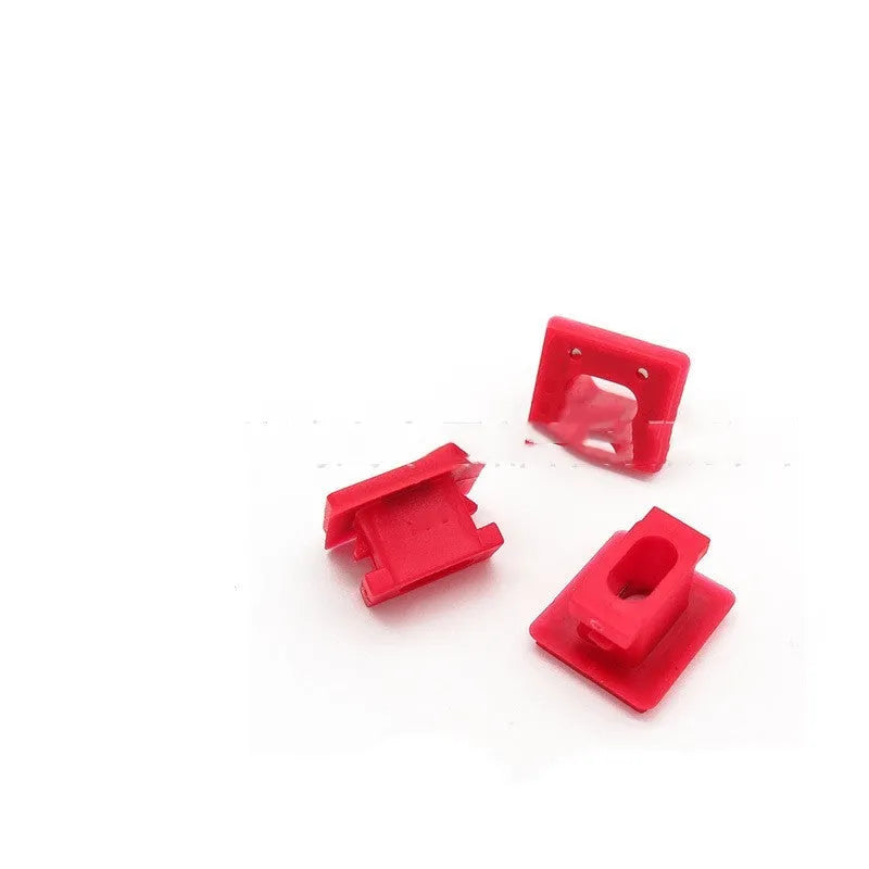 Ten black plastic BMW interior door trim panel clips on a white background