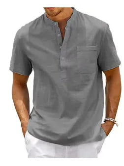 Men's solid colour loose-fit polo shirt with stand collar and short sleeves.