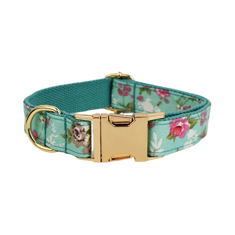 Rose pattern fabric dog collar set with green background including collar, leash, and detachable bow