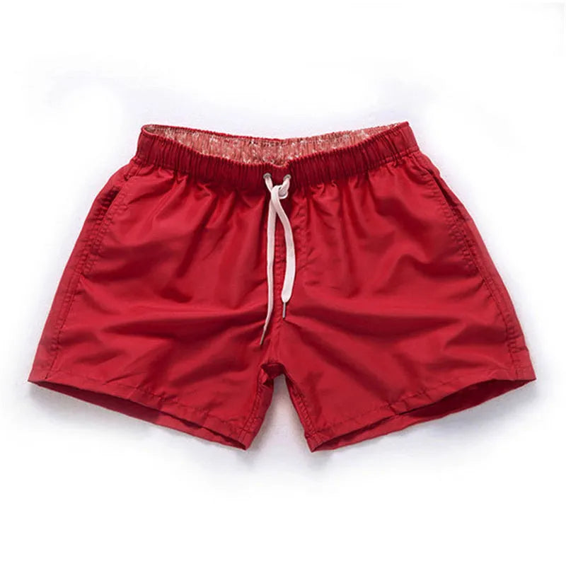 Men's plus size polyester beach shorts in black, showing straight leg opening.