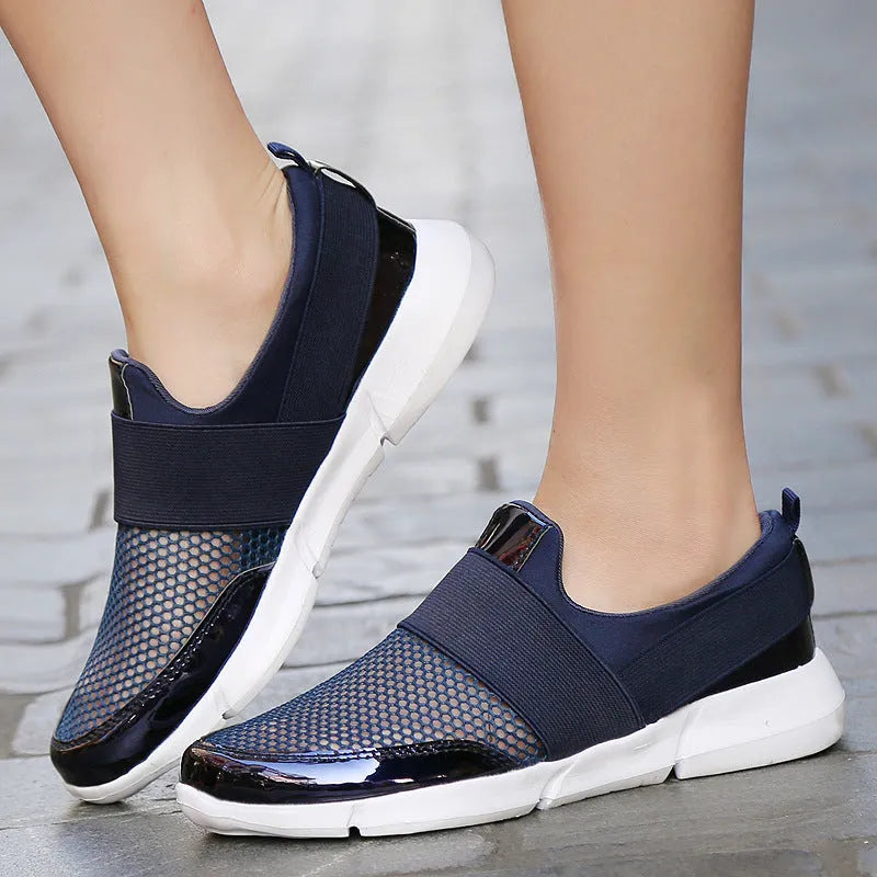 Blue, black, and grey low-cut women's casual sneakers with breathable mesh lining.