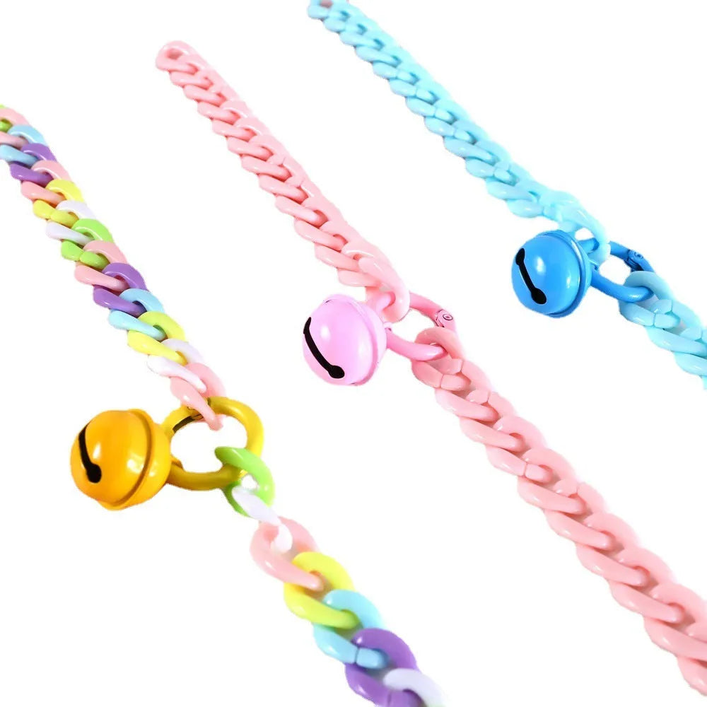 Plastic pet collar in macaron candy colours showing S and M sizes for cats, dogs, and rabbits