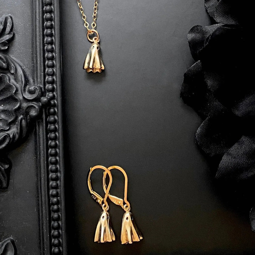 Ghost motif pendant necklace on a twisted stainless steel chain, available in Cable, Figaro, or Mini Staple chain styles.