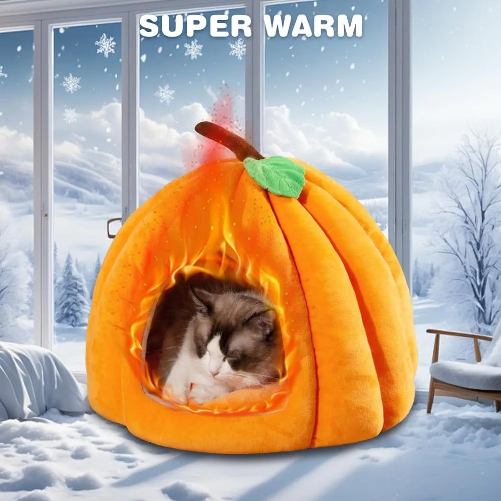 Orange pumpkin-shaped cat cave bed with plush entry hole on a wooden floor