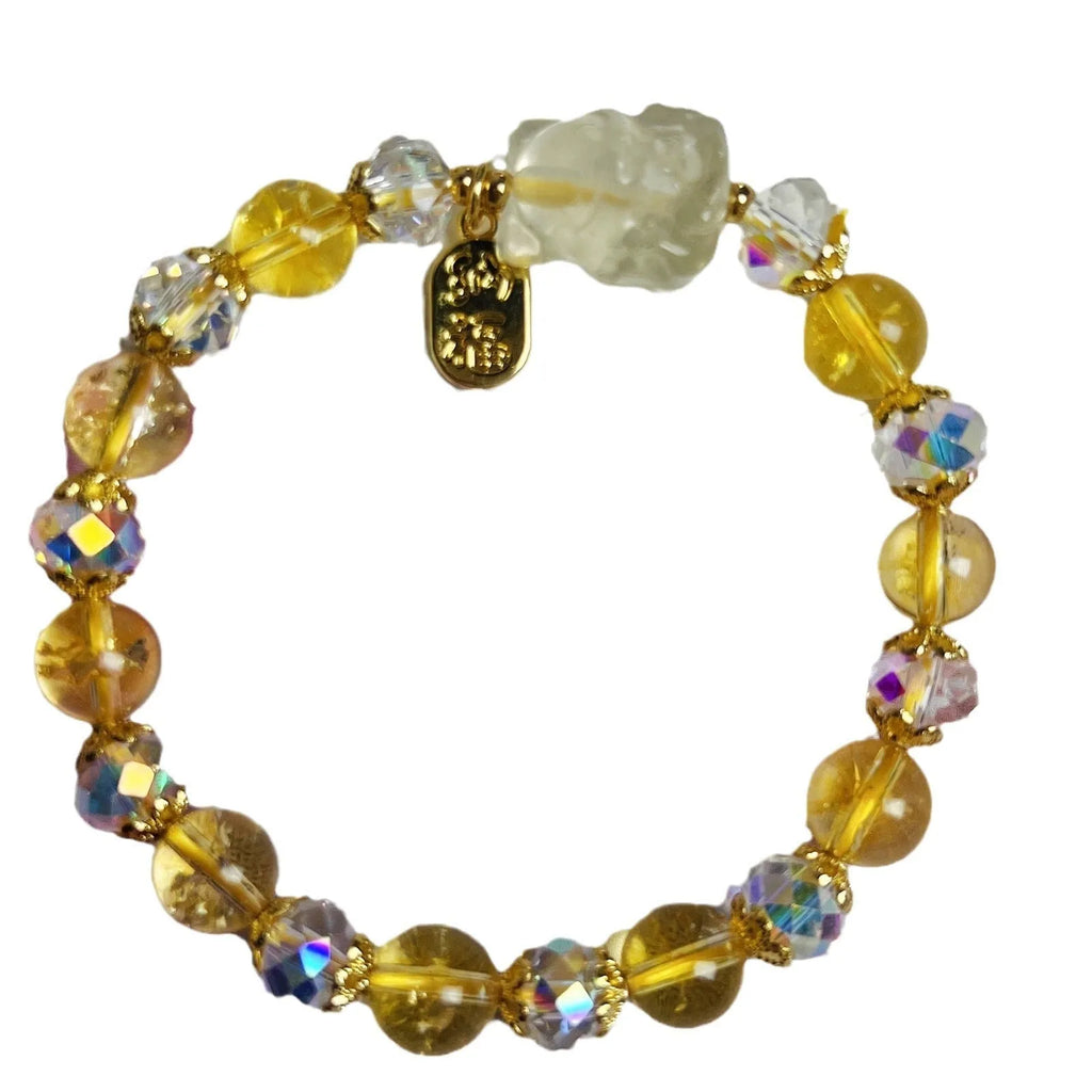Natural citrine nine-tail fox crystal bracelet for women on a wrist.