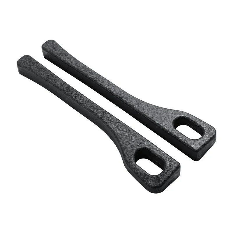 Car seat gap filler strip in polyurethane material shown installed between vehicle seat and centre console