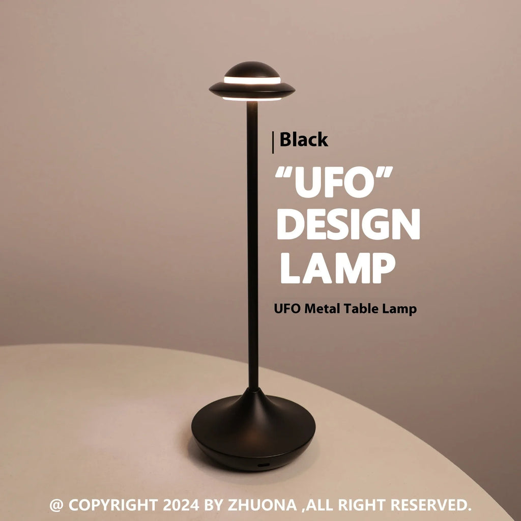 Modern metallic UFO-shaped table lamp with touch controls in black, gold, or grey finish.
