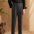 Man wearing slim-fit straight-leg business trousers in dark grey, suitable for office and formal events.