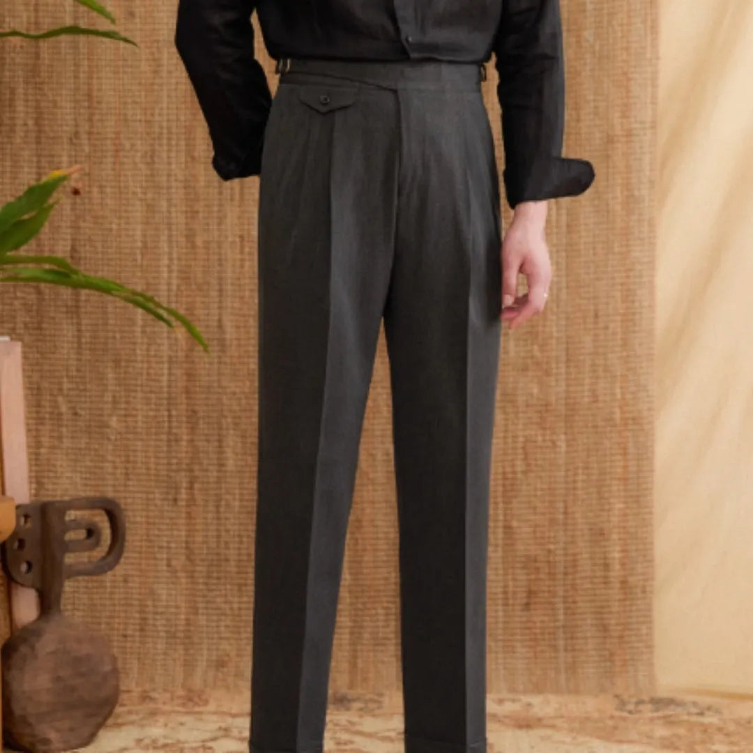 Man wearing slim-fit straight-leg business trousers in dark grey, suitable for office and formal events.