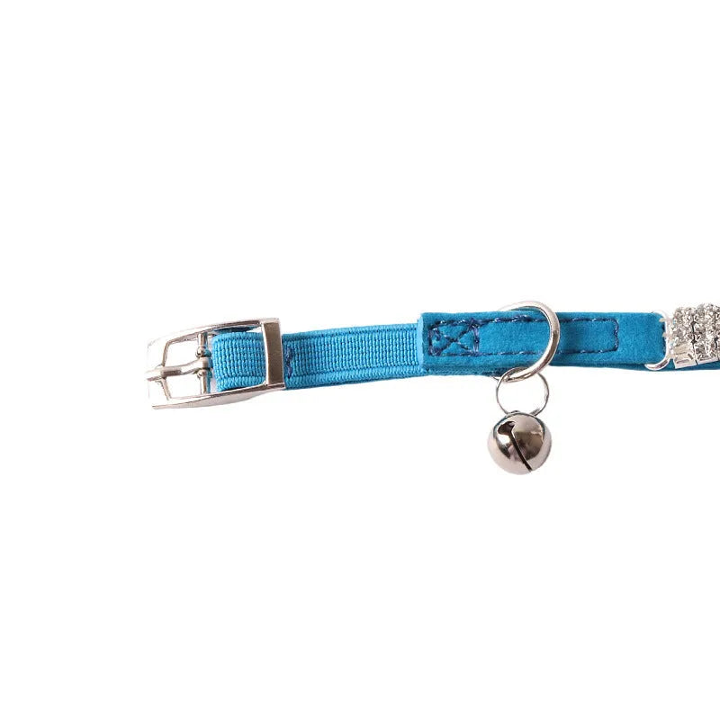 Soft flocking cat collar with elastic buckle in pink, black, red, blue, purple, and dark brown colours.