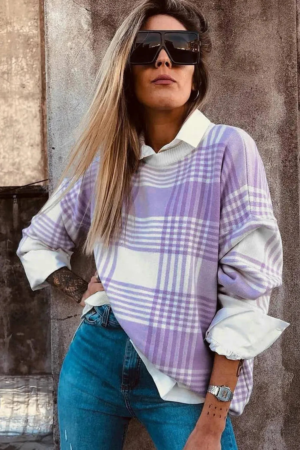 Lilac plaid print loose sweater with long sleeves and ribbed cuffs.