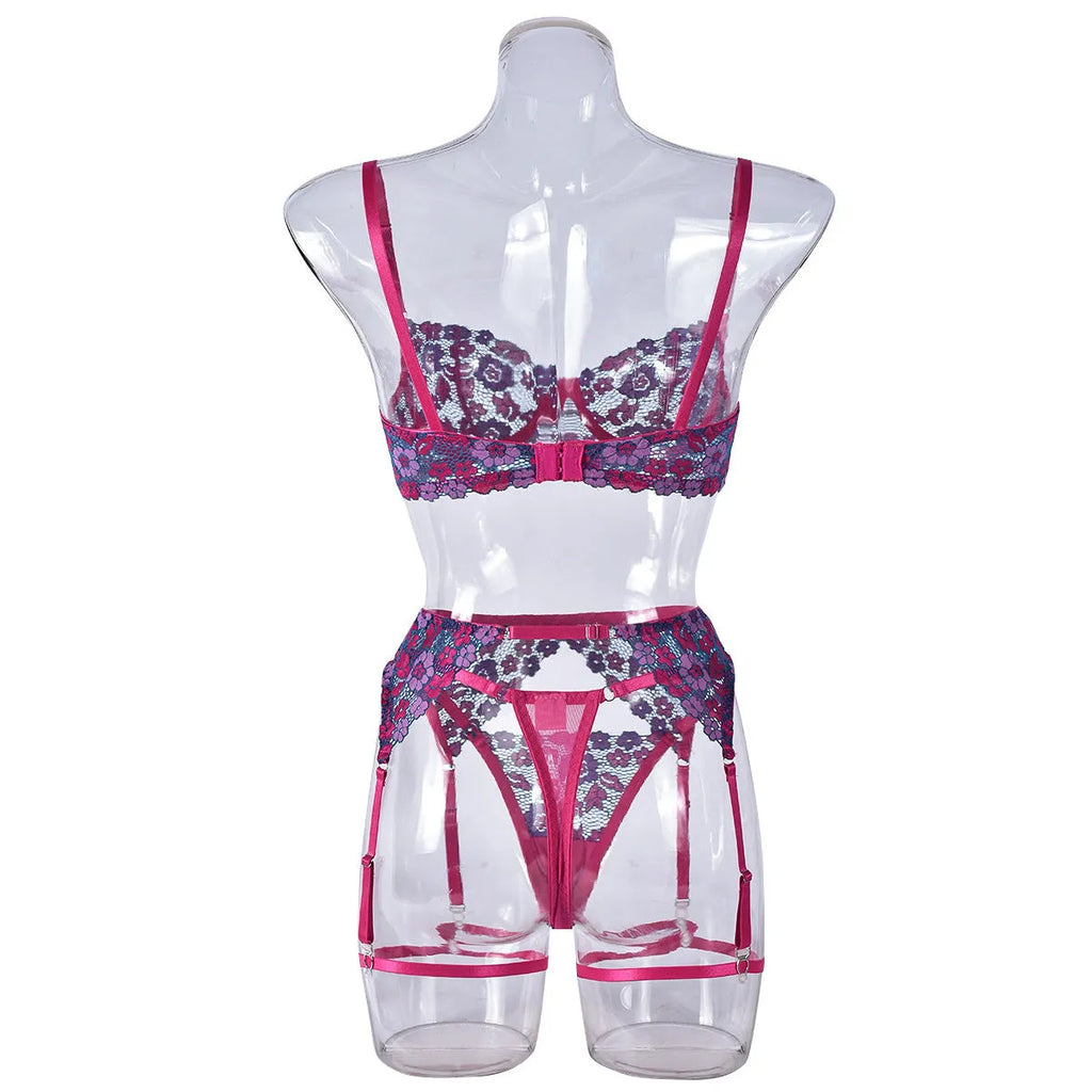 Rose red women's embroidered bikini swimsuit set on a white background.