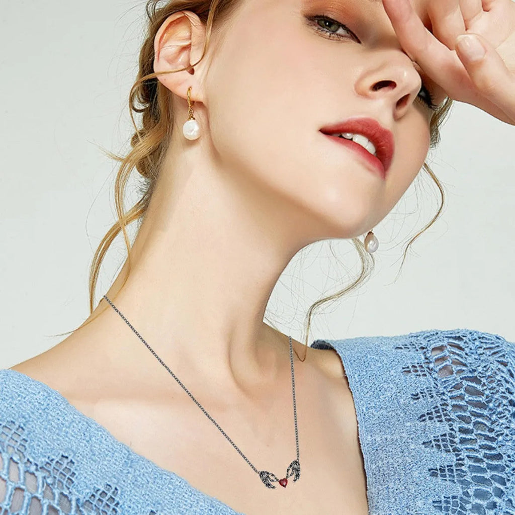 Dark red heart-shaped ghost claw pendant necklace on copper O-ring chain, unisex fashion jewellery, 41-50cm.
