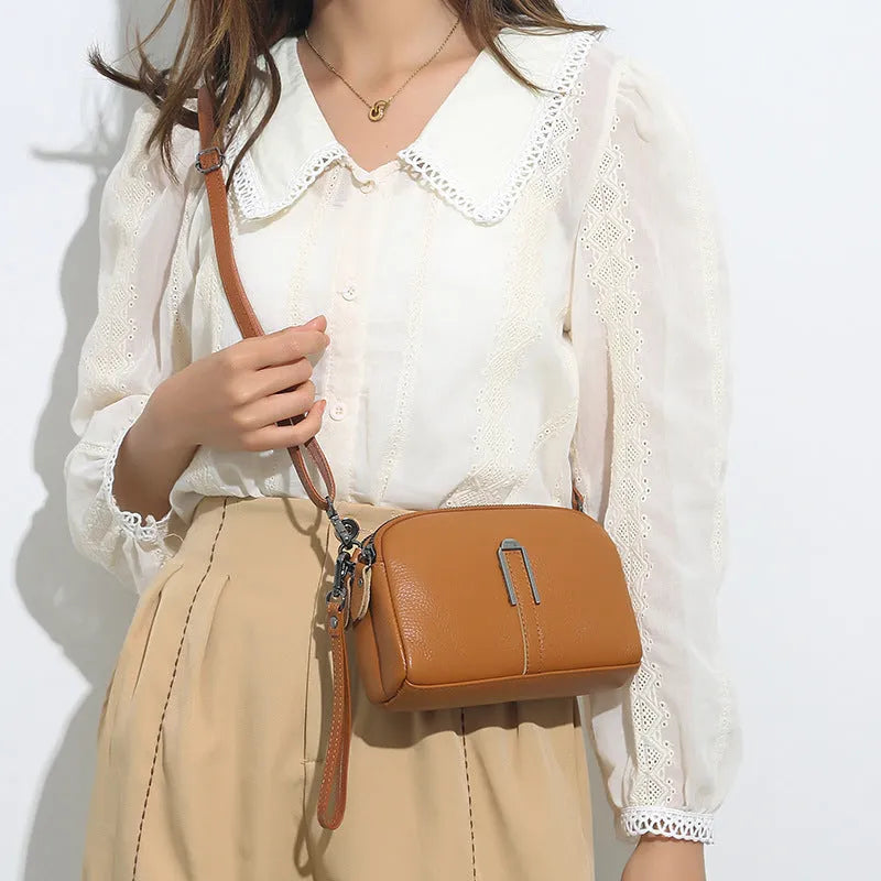Genuine leather women's shoulder bag in urban square design, shown in dark khaki colour.