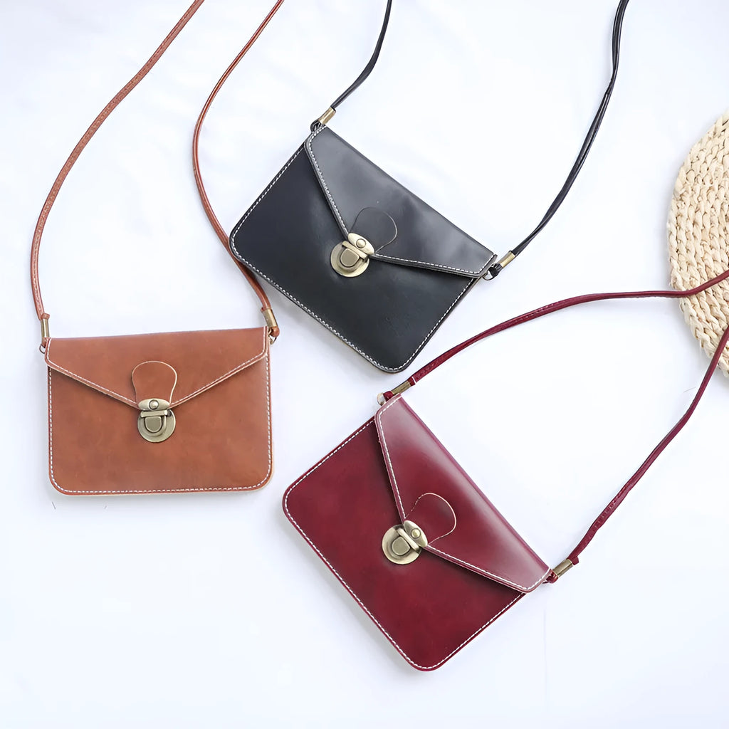 Retro soft surface messenger bag with lock closure showing wine red colour option