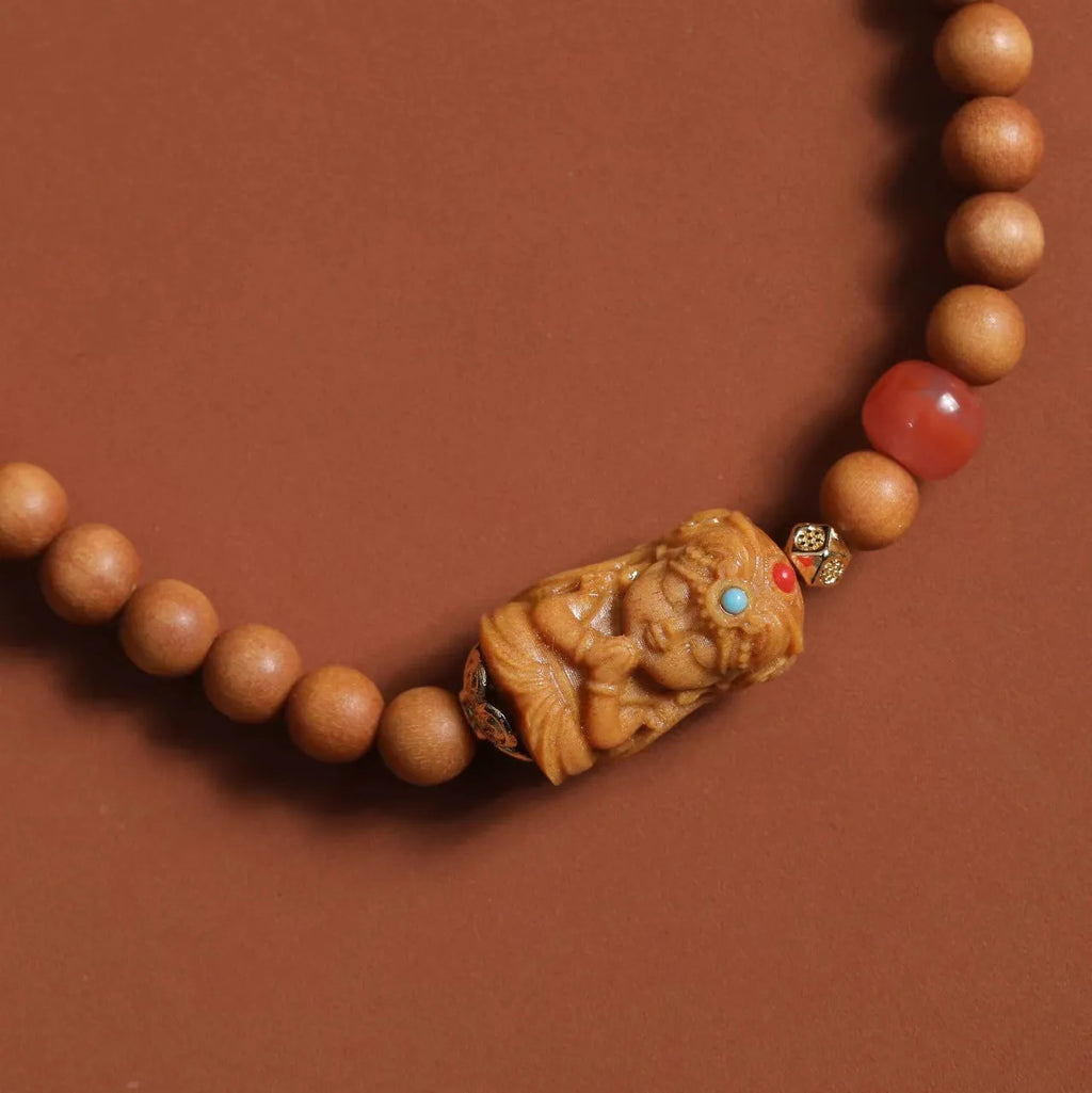 Brown sandalwood bracelet with South Red Zachilam patterns and 6mm round wooden beads