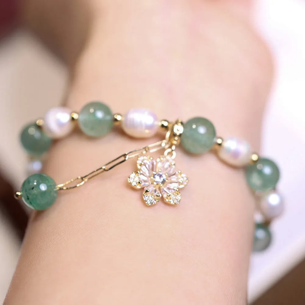 Green strawberry freshwater pearl bracelet with Chinese knot design and jade flower decorations