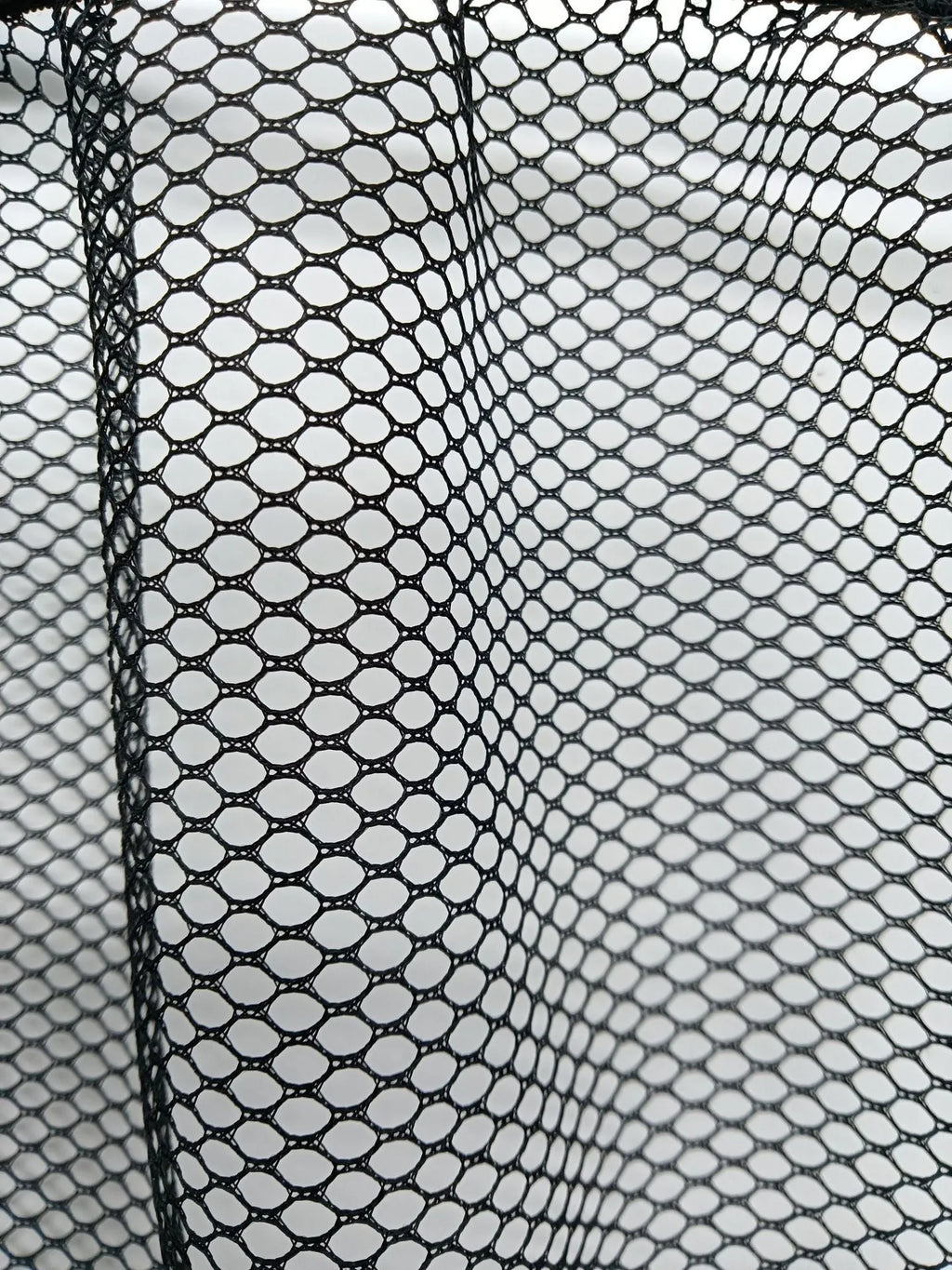 Polyester elastic storage net for organising items in a car boot, shown in 20x35cm and 20x45cm sizes.