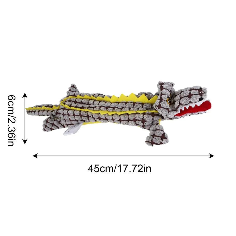Blue crocodile-shaped plush squeaky dog toy shown beside coffee and grey colour options in small and large sizes