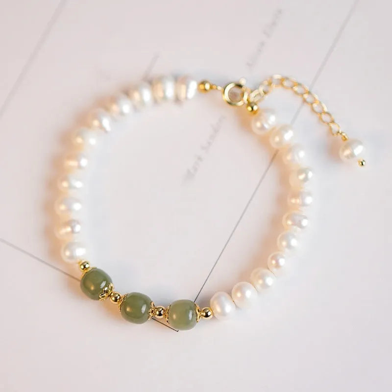 Natural freshwater pearl bracelet with diamond-shaped beads in an electroplated Hetian jade colour.