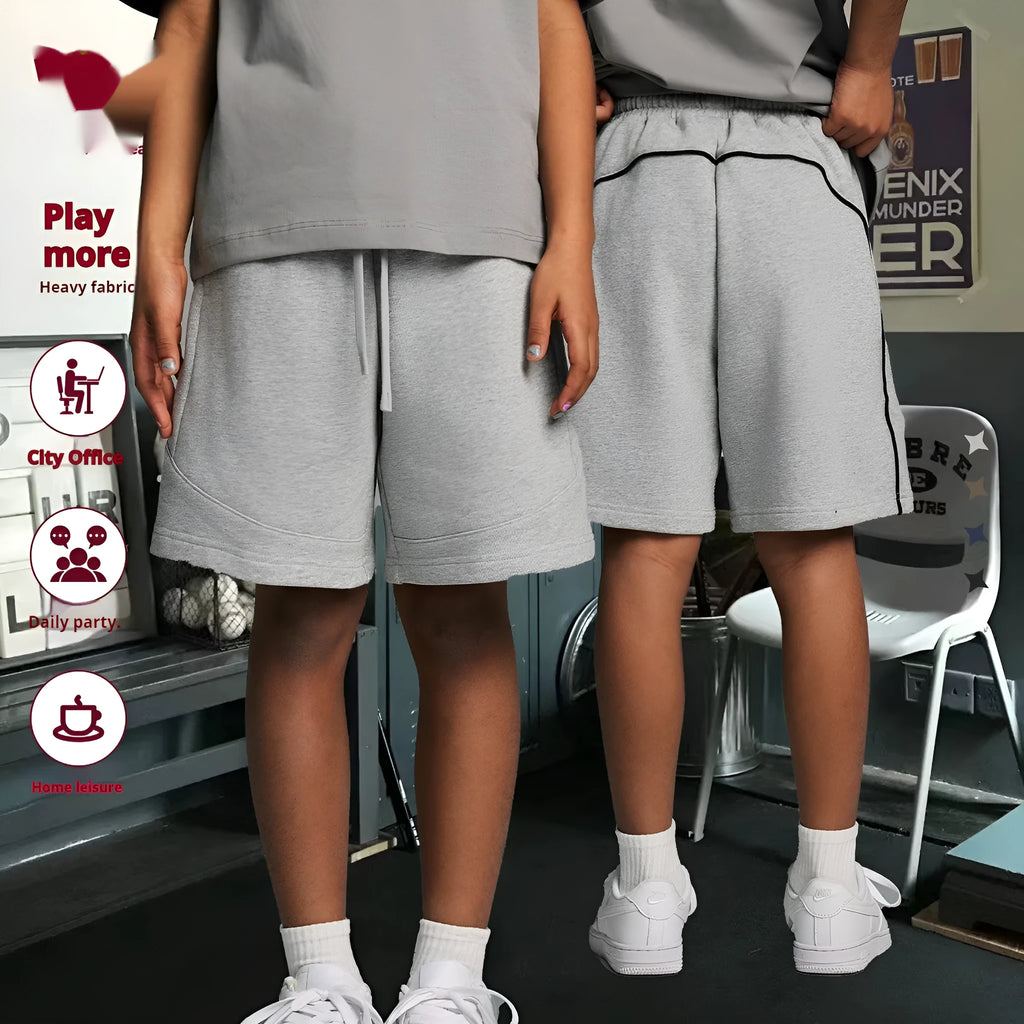 Solid colour cotton children's shorts with loose fit for sports and casual wear
