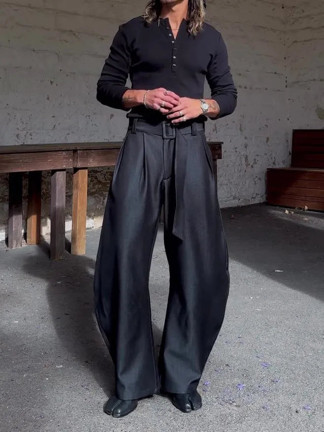 Black polyester oversized wide-leg pants with high-waisted belt, full-length, casual fit