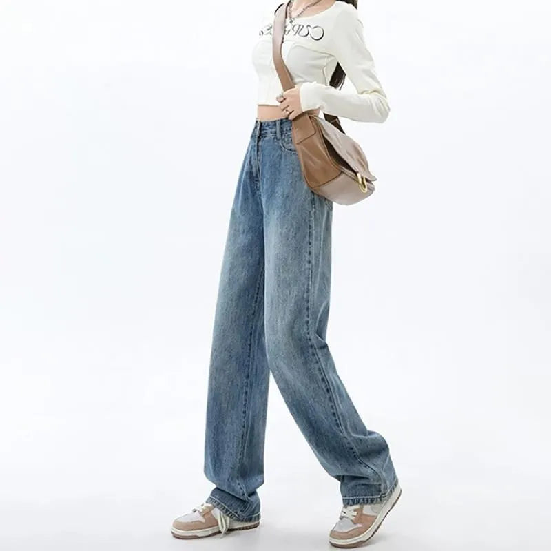Retro blue high-waist wide leg jeans on a hanger showing straight leg trouser cut.