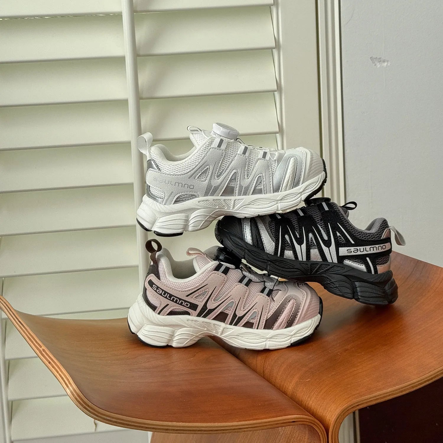 PU leather mesh casual trainers in black, beige, or pink on a white background.