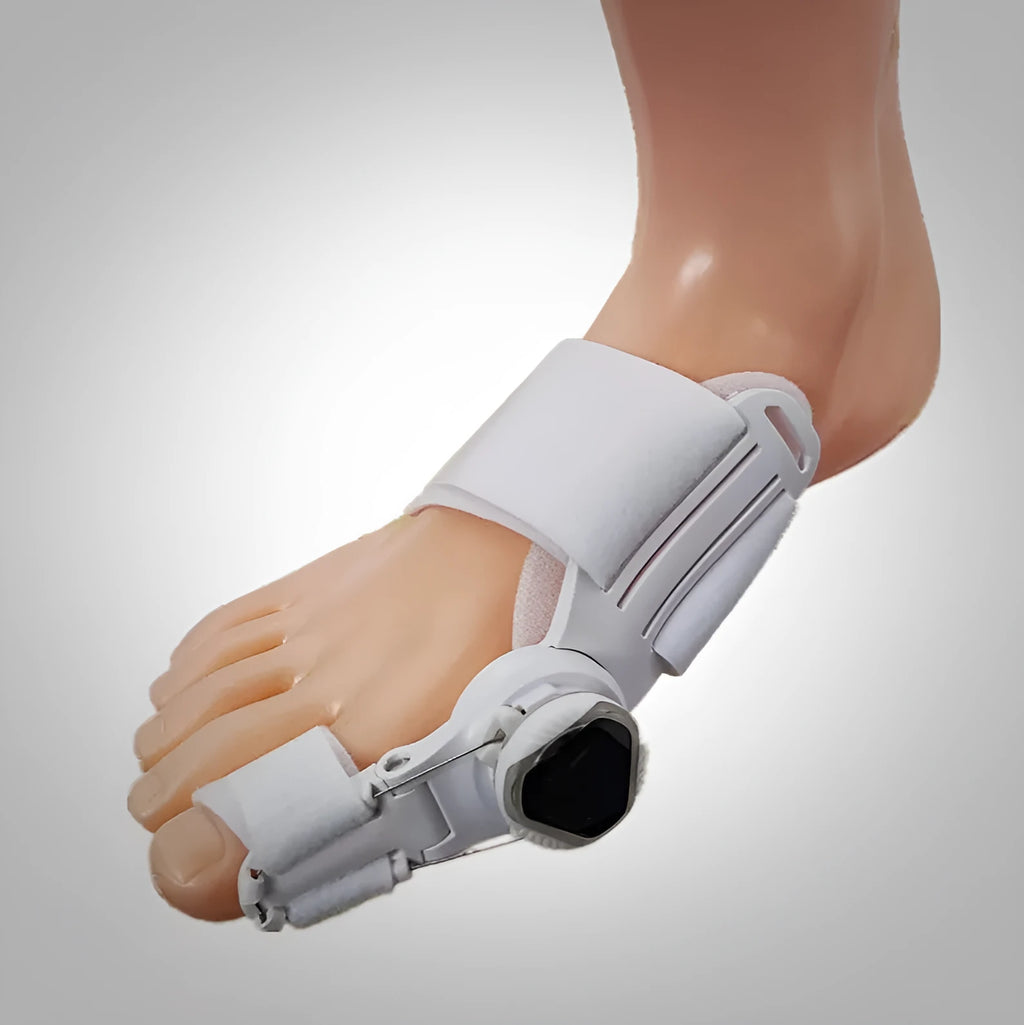 Mechanical adjustable ABS hallux valgus corrector with toe splitter on white background