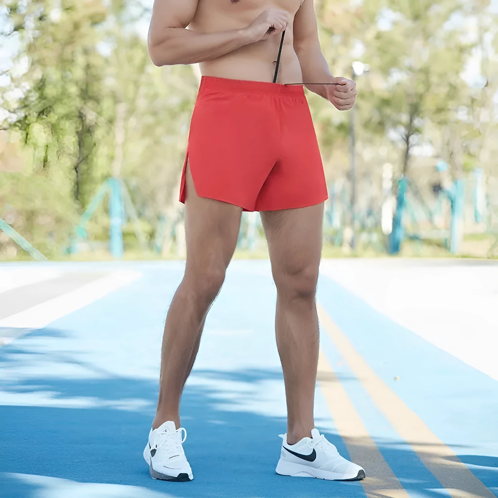 Men's loose fit high-waist off-road running shorts in red, shown front view