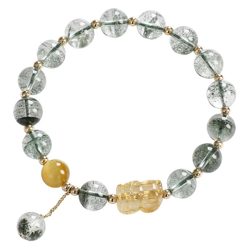 Green phantom quartz crystal bracelet with 8mm geometric beads showing gold rutile inclusions