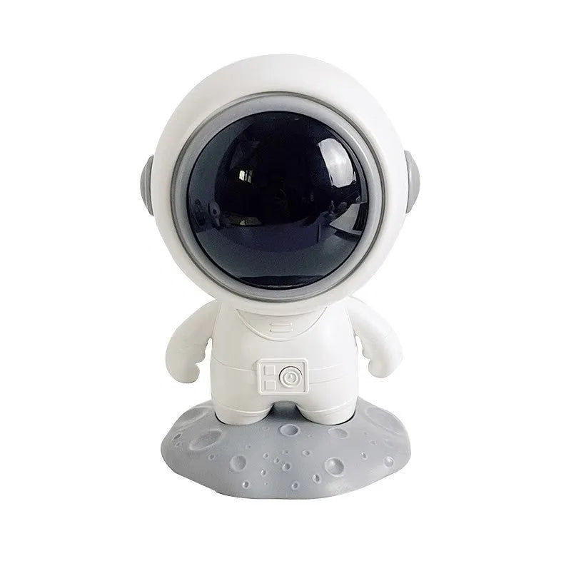 Spaceman Bluetooth speaker in moon astronaut design on desktop