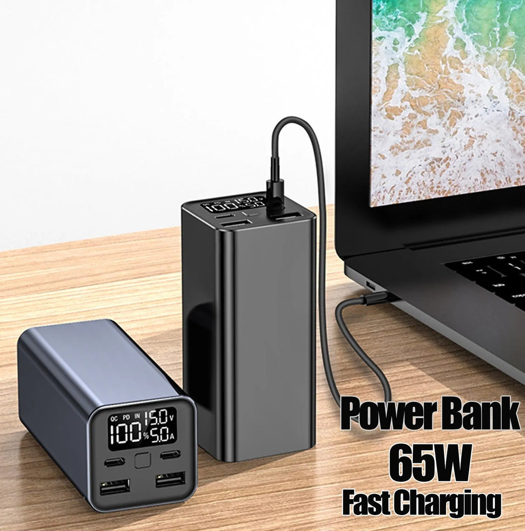 Black 65W metal power bank showing USB-C port, with dimensions 47.5x104.5x47.5mm.