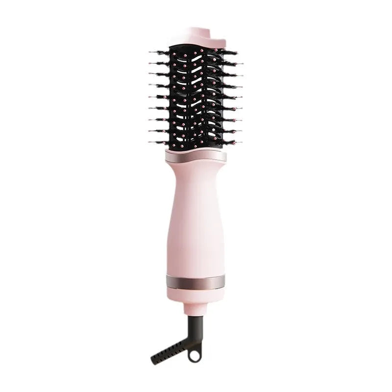 Pink multifunctional hair dryer with integrated comb and curling attachment showing constant temperature technology