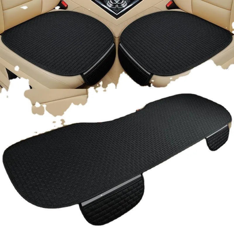 Linen car cushion set in plaid pattern with hemming style edges shown in classic black and red colour option