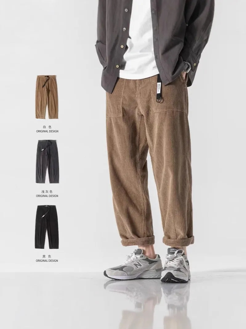 Loose straight tapered trousers with wide legs in dark grey, black, and khaki colours