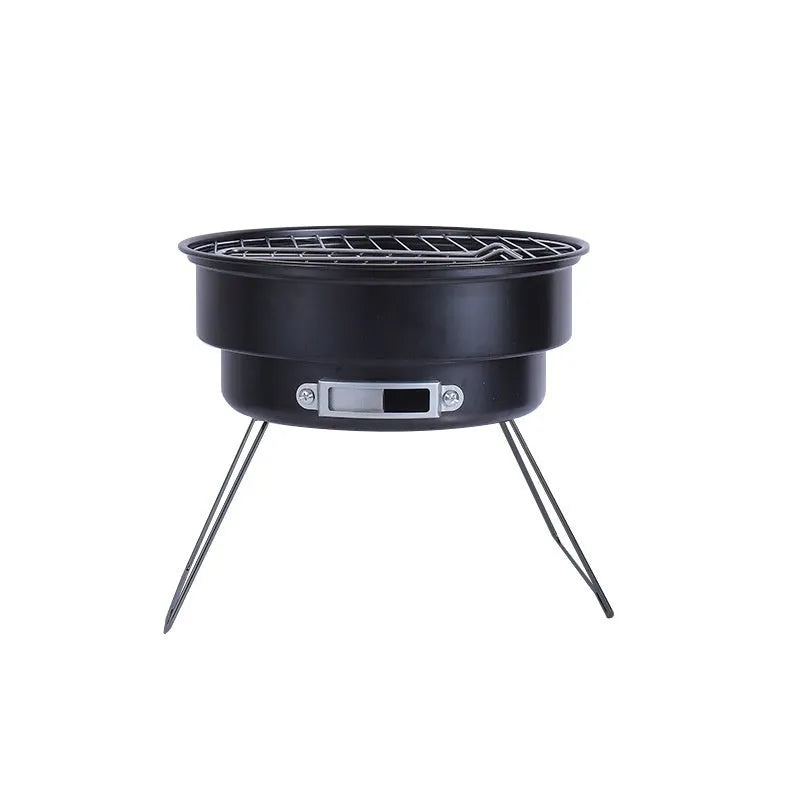 Small folding round metal ice stove with grill mesh, leg, and storage bag for portable barbecues.