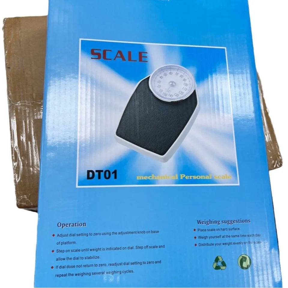 Black mechanical weight scale with large dial measuring 47x35x11cm