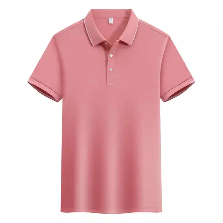 Man wearing a loose fit apricot coloured short sleeve cotton blend polo shirt.