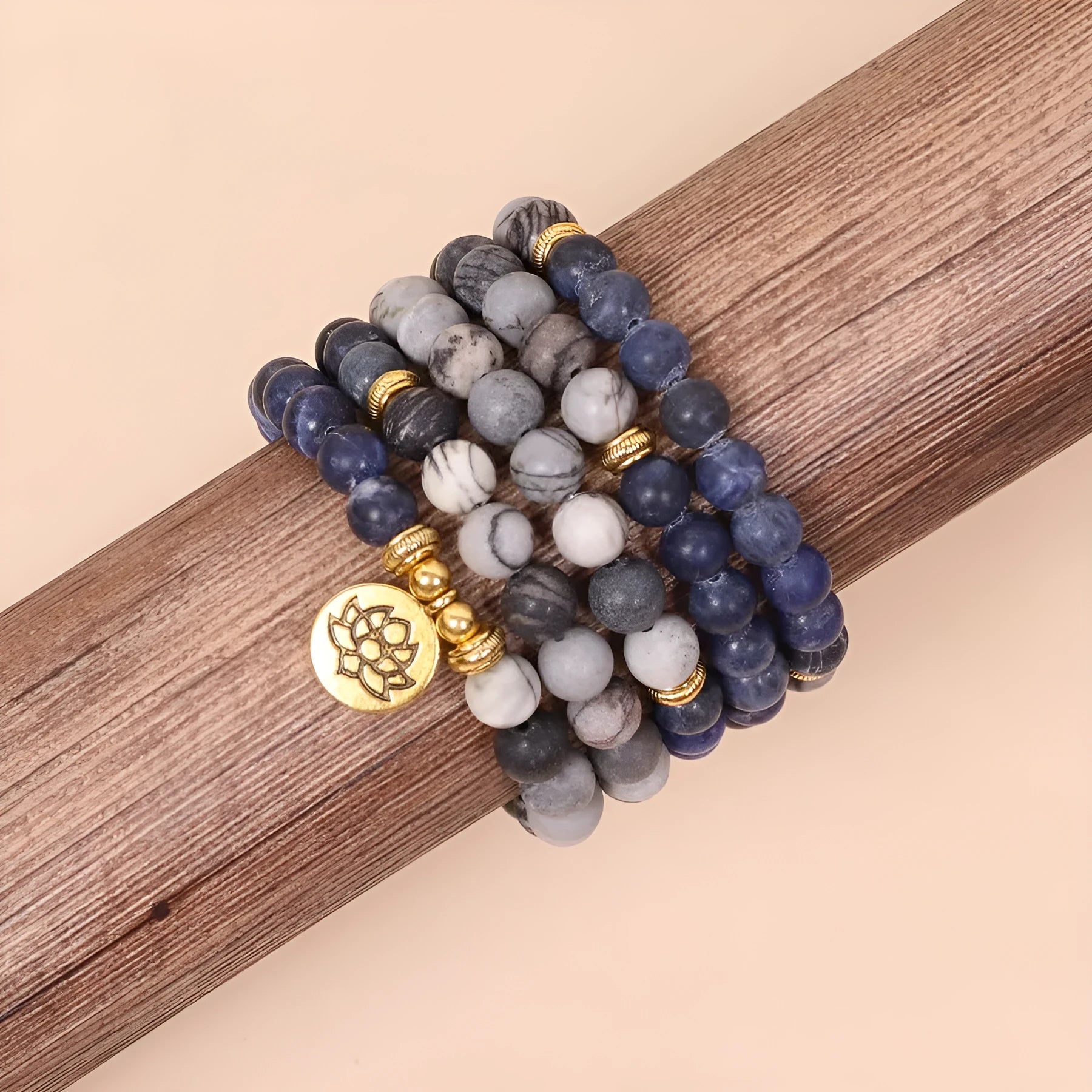 Blue multi layer bracelet with patterned network stone beads on alloy strands