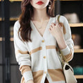 Women's slim fit striped V-neck knitted cardigan in a 3D pattern on a hanger.