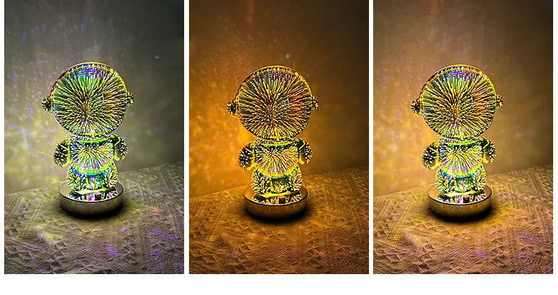 3D stereo astronaut atmosphere light with glass shade and USB charging on a desk