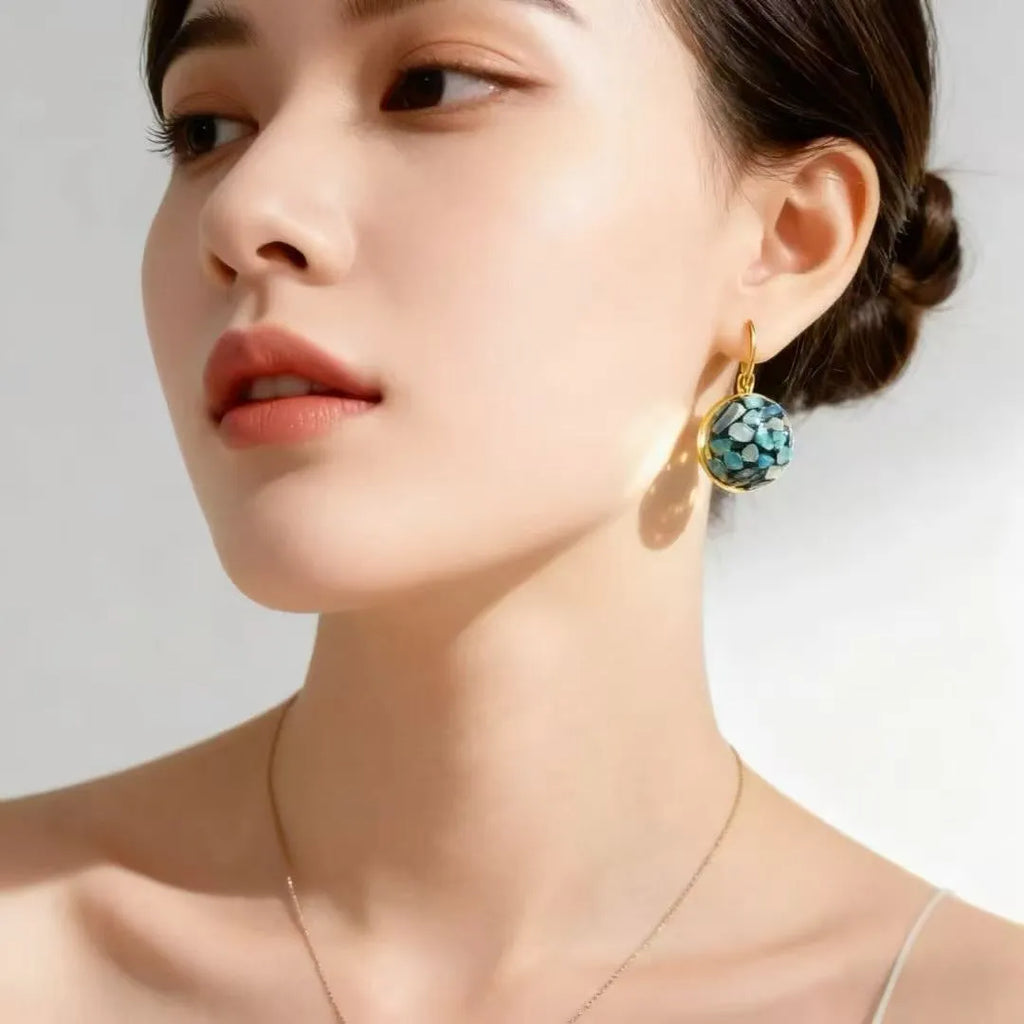 Handmade mother-of-pearl earrings for women with Chinese Fu character motif and iridescent shell finish