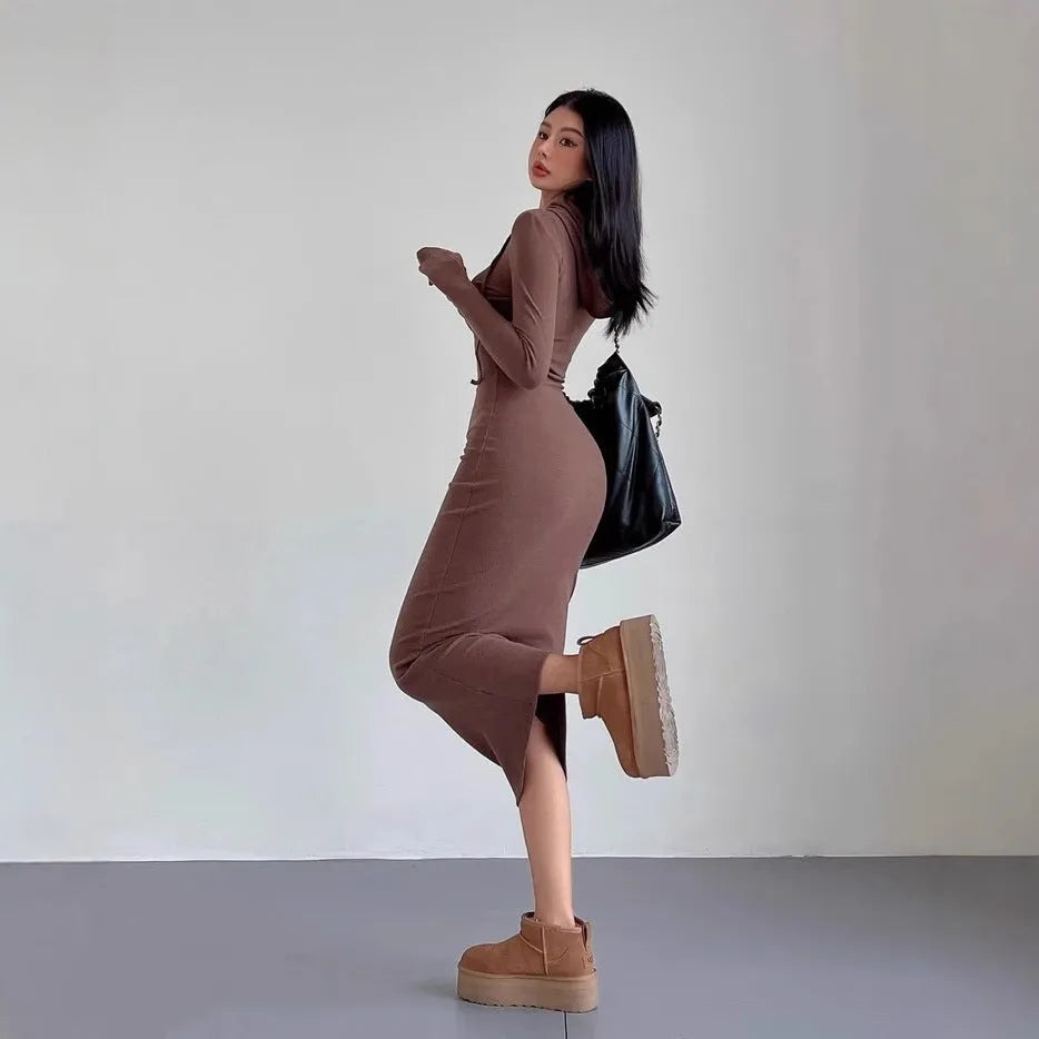 Women's long sleeve hooded sheath dress in grey shown at knee length