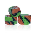 Two silicone camouflage-style facial muscle fitness balls for jaw training in transparent boxes.