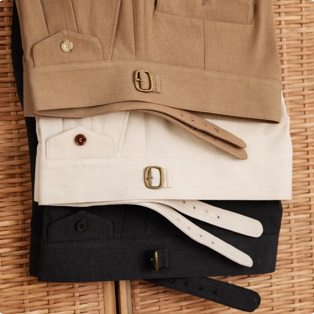 Man wearing slim-fit straight-leg business trousers in dark grey, suitable for office and formal events.