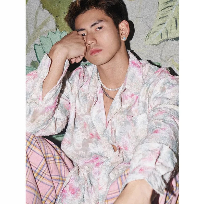 Men's pink floral long sleeve shirt with embossed pattern and loose fit.