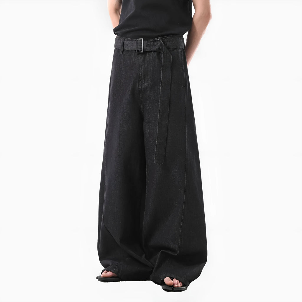 Black women's high waist straight leg jeans with gold detailing and a zip fly.